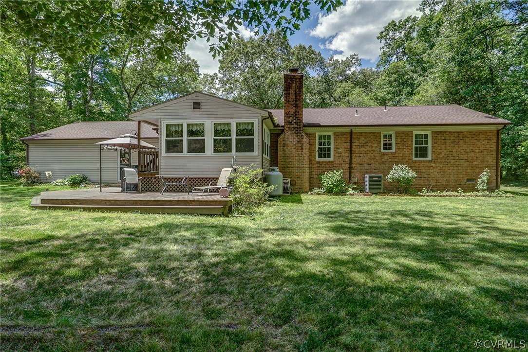 7651 Varann Road Henrico, VA 23231 - Photo 10 of 44 a front view of a house with garden