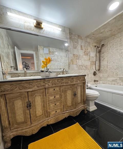 1203 River Road, Unit 19K Edgewater, NJ 07020 - Photo 9 of 19 a bathroom with a sink a toilet and mirror