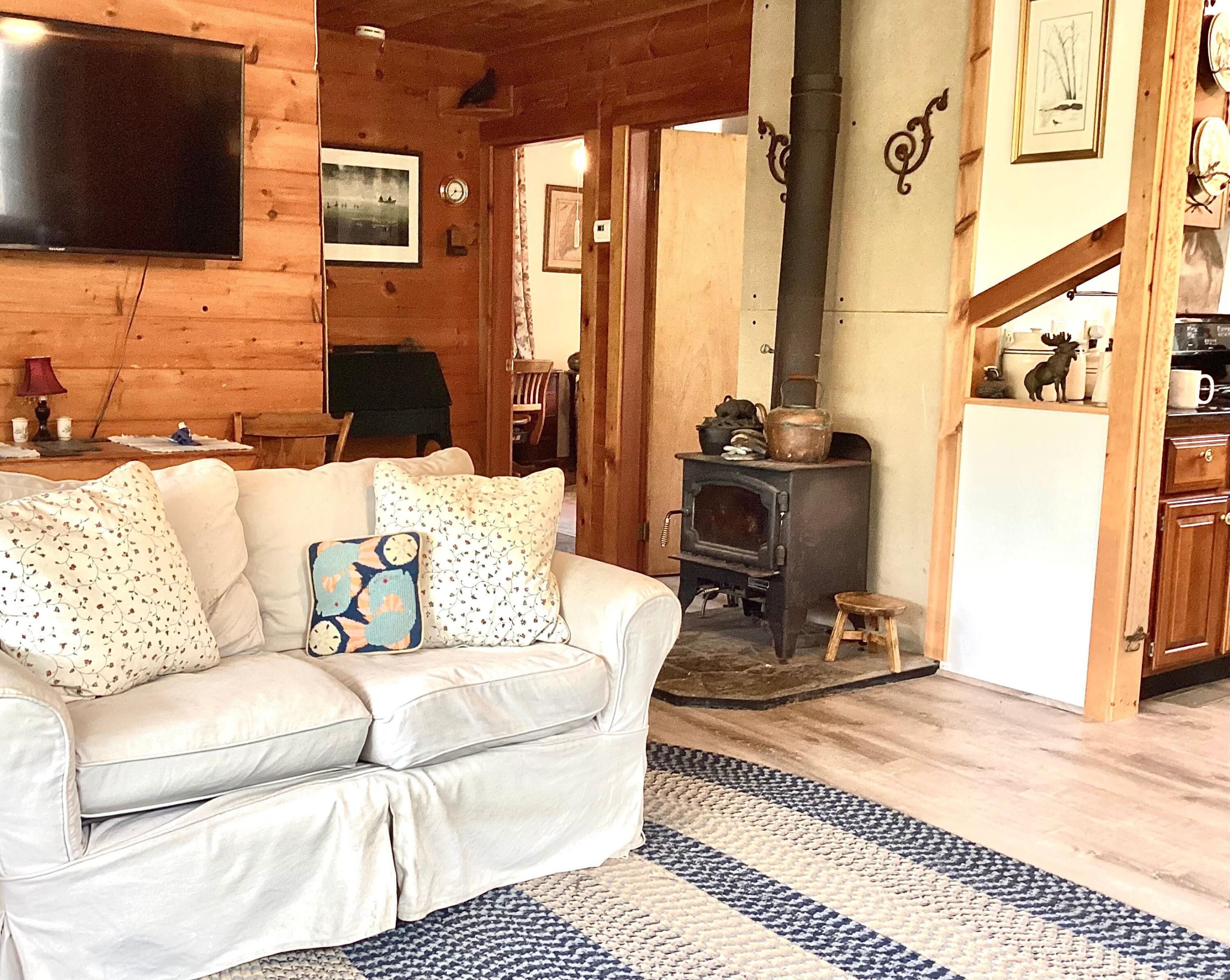751 Duck Cove Road Roque Bluffs, ME 04654 - Photo 17 of 49 Living Room with Wood Stove