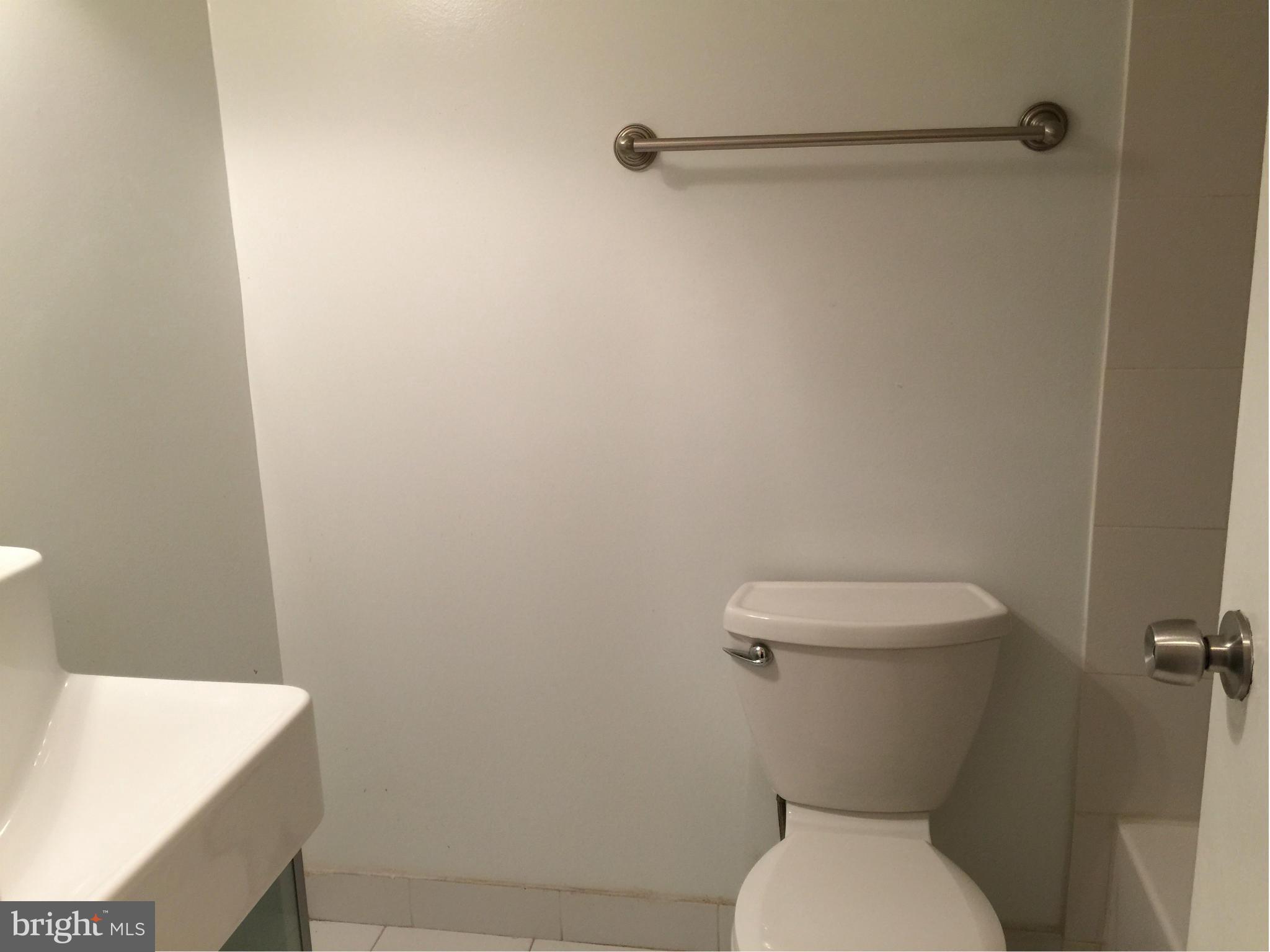 3942 Bel Pre Road, Unit 1 Silver Spring, MD 20906 - Photo 13 of 20 Hall Bath with tub