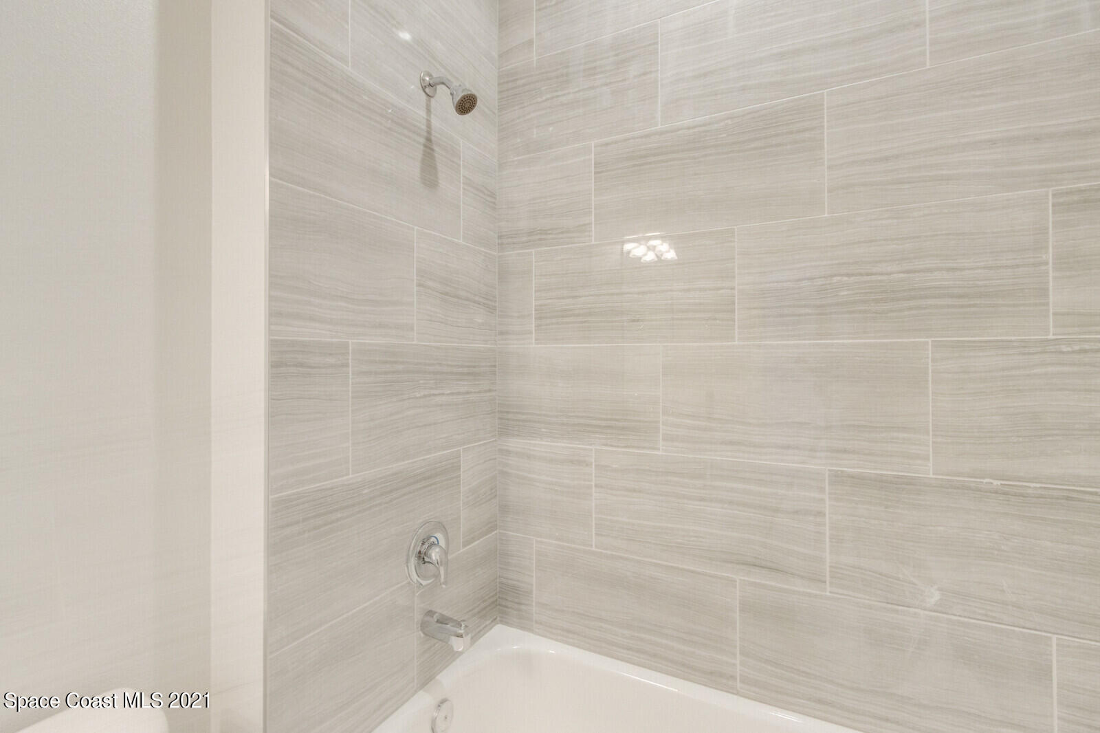 1336 Rabbit Street Southeast Palm Bay, FL 32909 - Photo 12 of 16 a bathroom with a shower