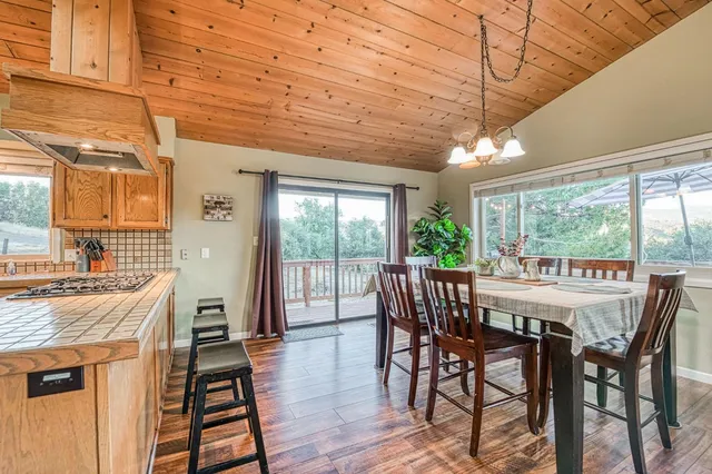 a bathroom with a double vanity sink toilet and shower