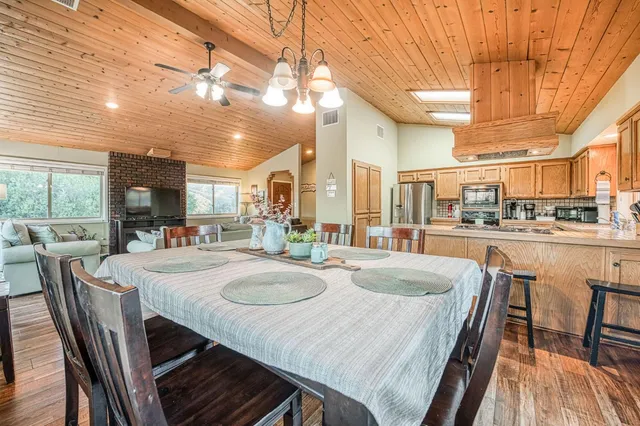 an aerial view of a house with mountain view