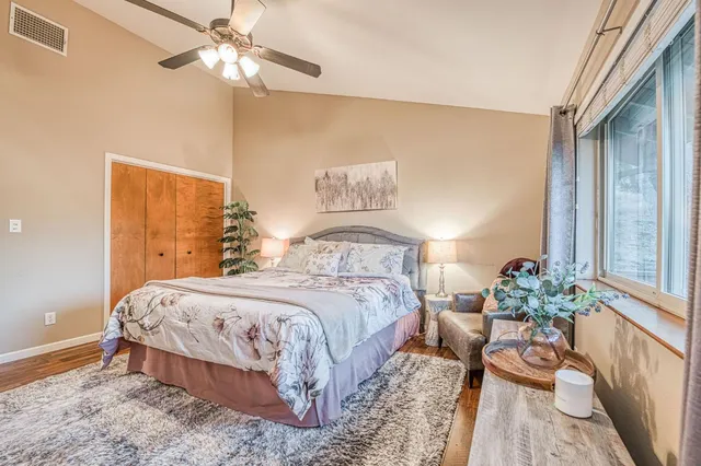 a view of balcony with wooden floor and outdoor seating