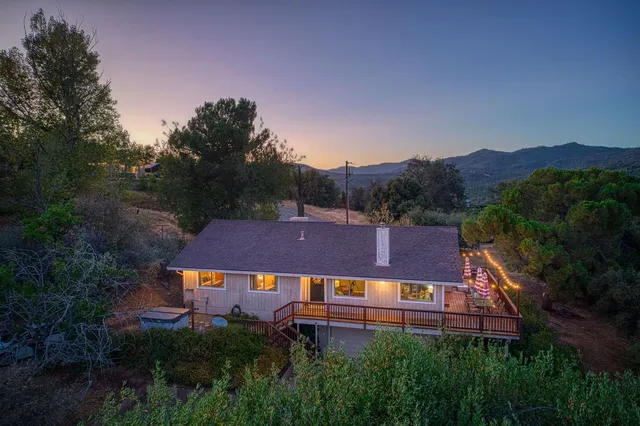a house view with a backyard space