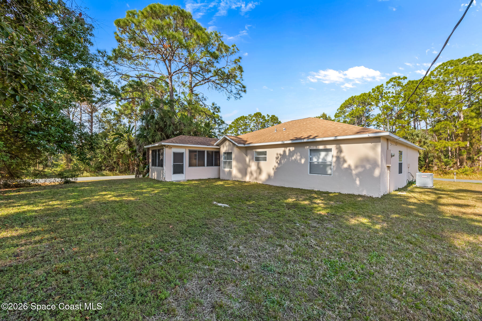 1596 Holbrook Road Northwest Palm Bay, FL 32907 - Photo 19 of 20 Backyard