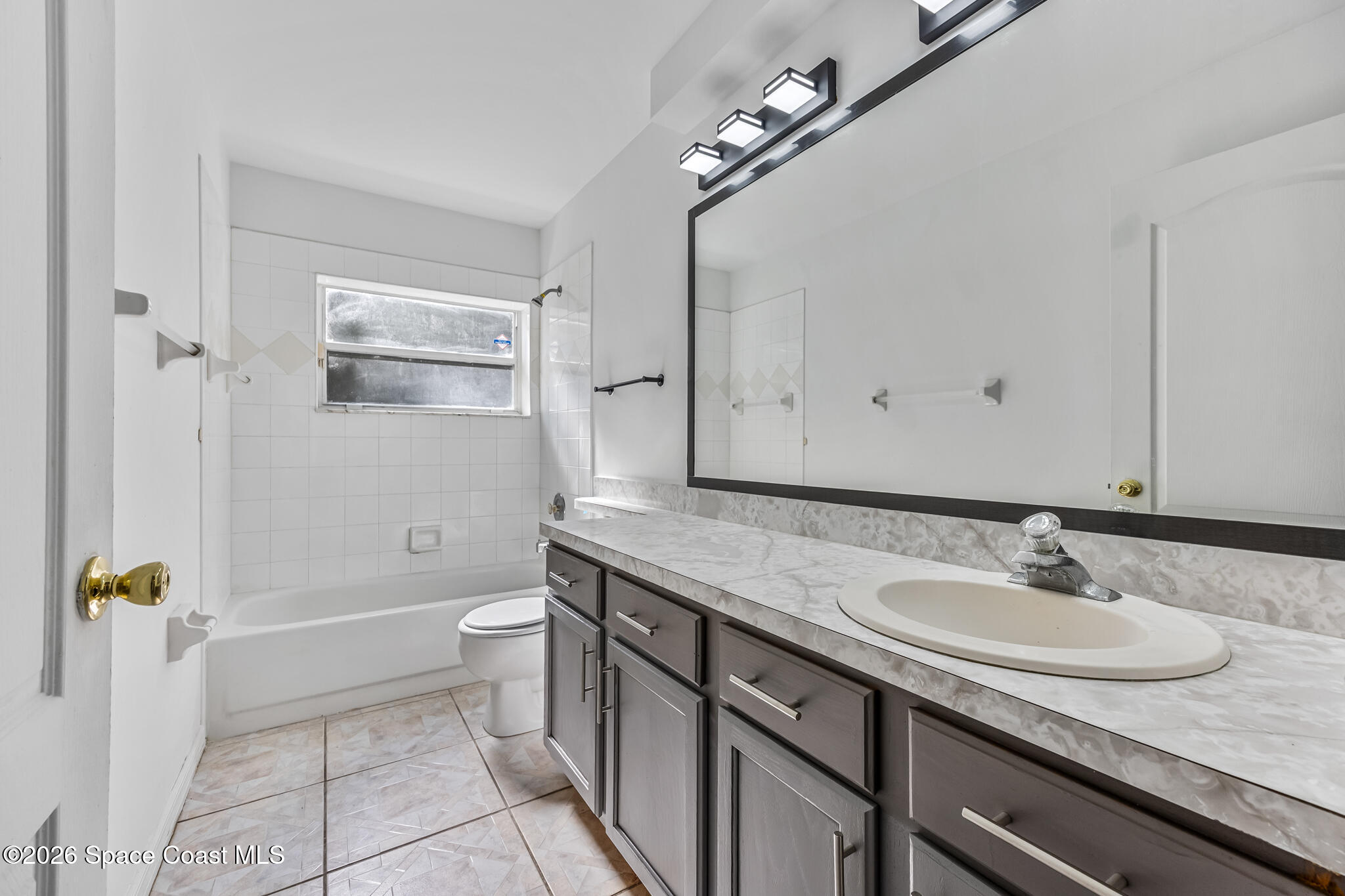 1596 Holbrook Road Northwest Palm Bay, FL 32907 - Photo 5 of 20 2nd Full Bathroom