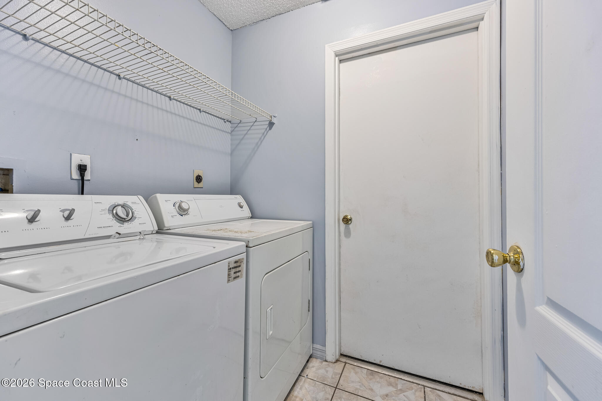 1596 Holbrook Road Northwest Palm Bay, FL 32907 - Photo 6 of 20 Laundry Room