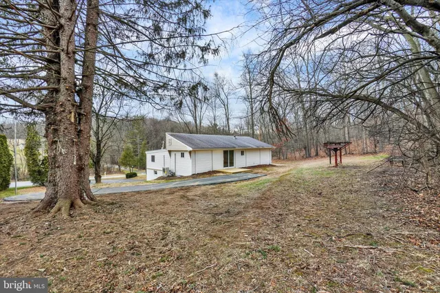 a house with trees in front of it