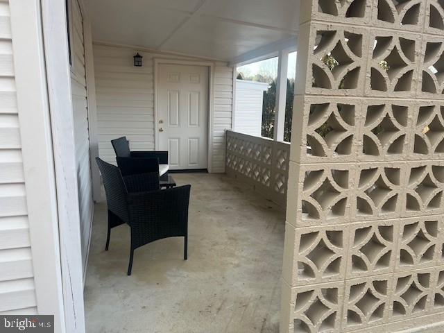 515 East Snyder Corner Road Red Lion, PA 17356 - Photo 6 of 8 a room with a chair and a window