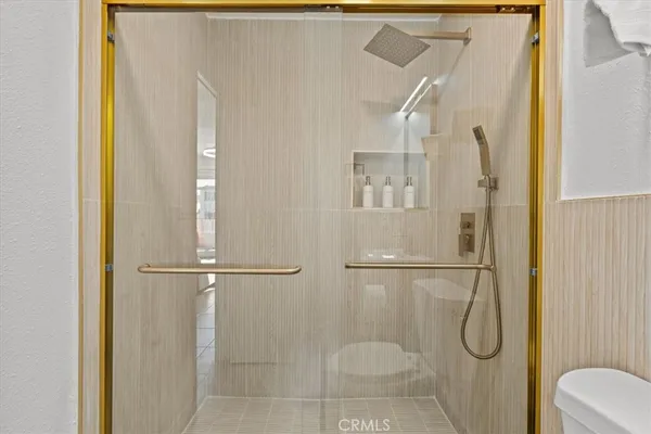 a view of a house with potted plants