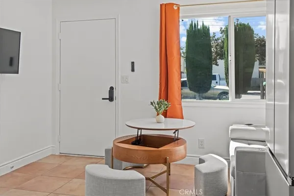 a bathroom with a toilet a sink and a mirror