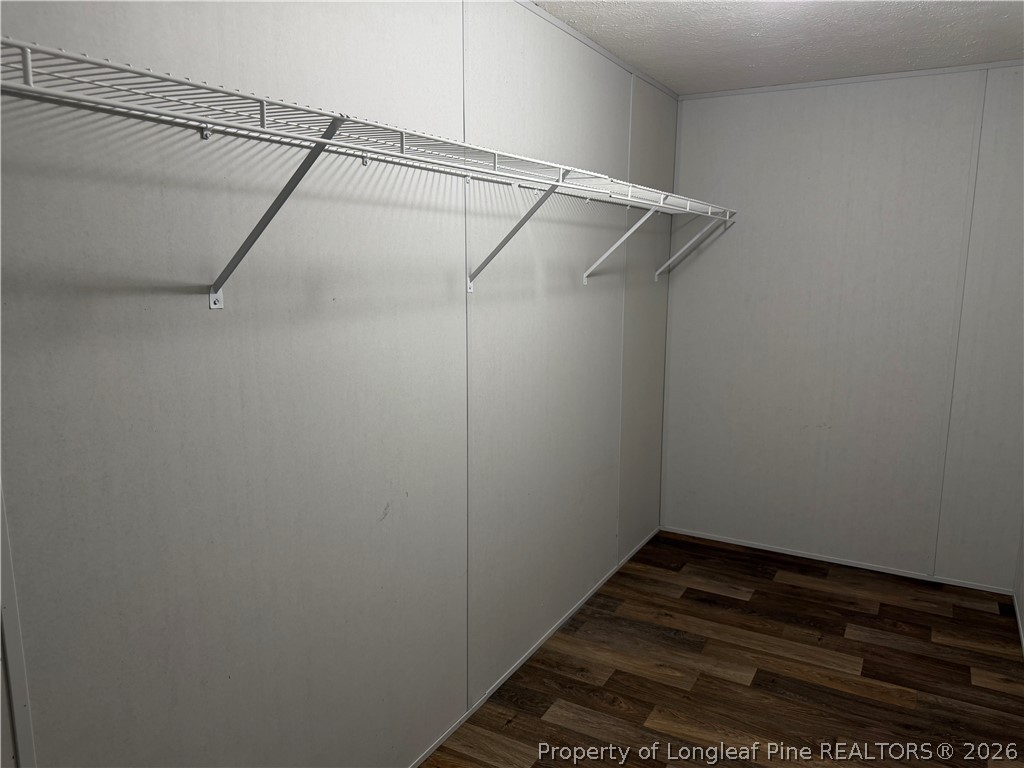 4339 Saddletree Road Lumberton, NC 28360 - Photo 19 of 23 a view of a room with racks on the wall