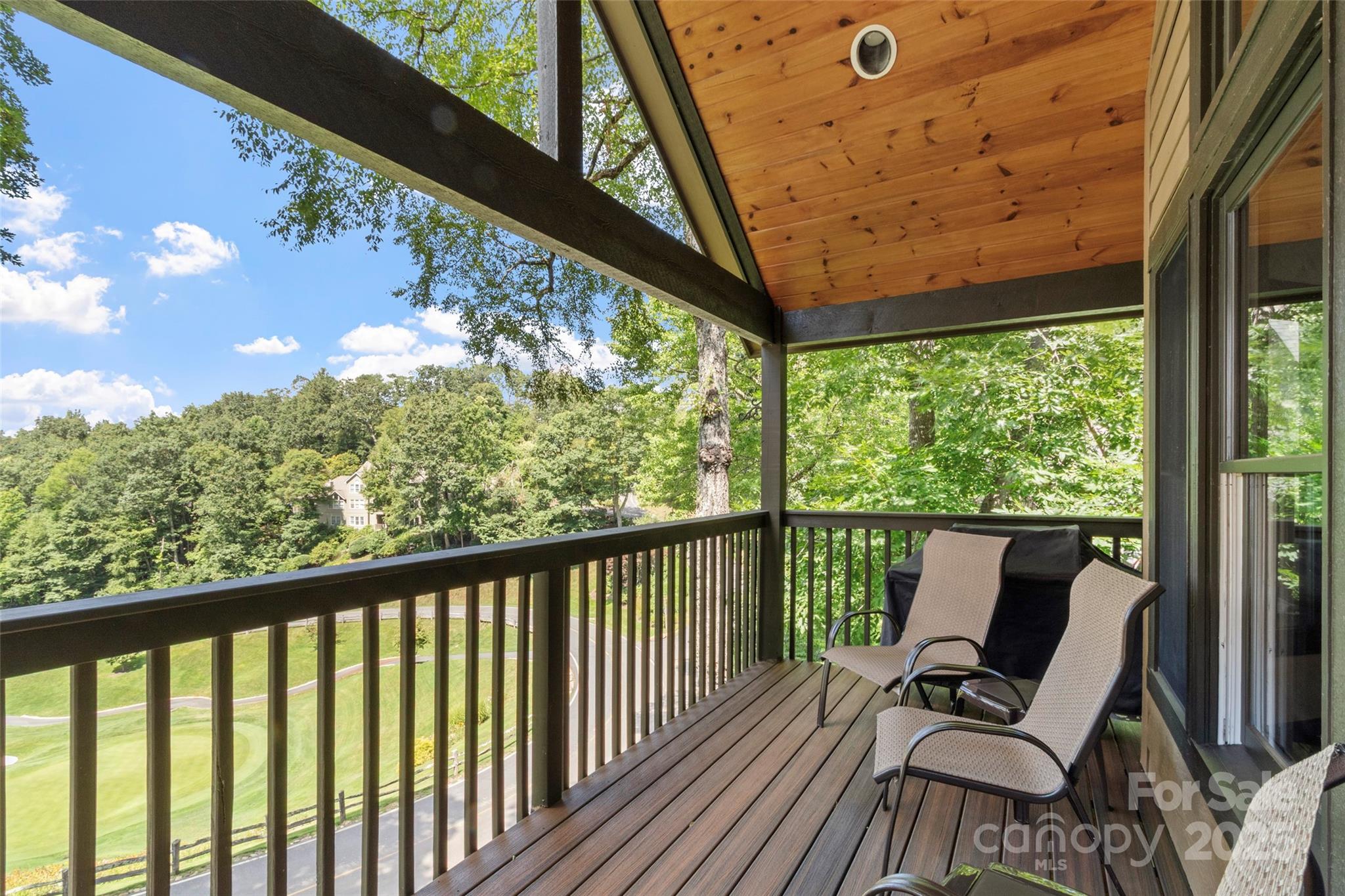 91 Brandy Run Road Burnsville, NC 28714 - Photo 18 of 48 a view of a two chair in the balcony