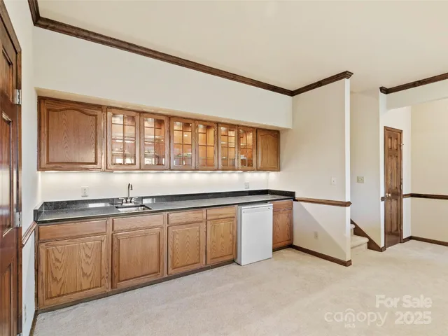 a bedroom with a large bed and a large window