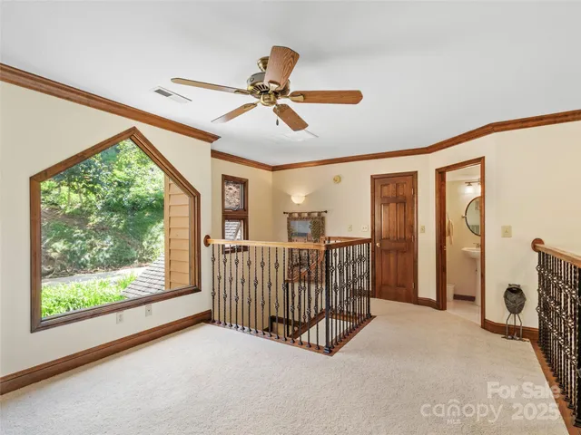 a workspace with furniture and a window
