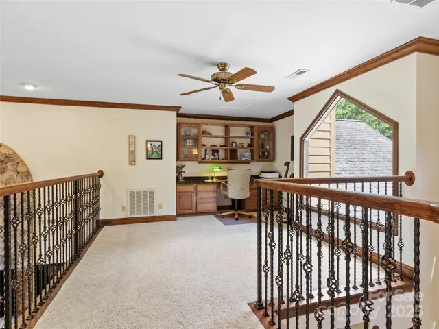 a utility room with furniture and a window