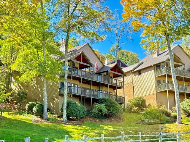 a view of a wooden fence