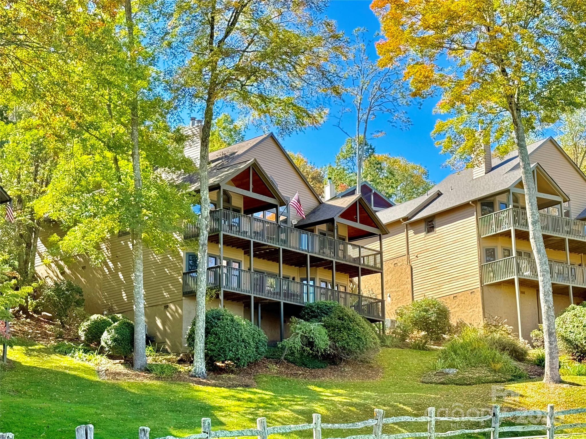 91 Brandy Run Road Burnsville, NC 28714 - Photo 46 of 48 a view of a house with pool and sitting area