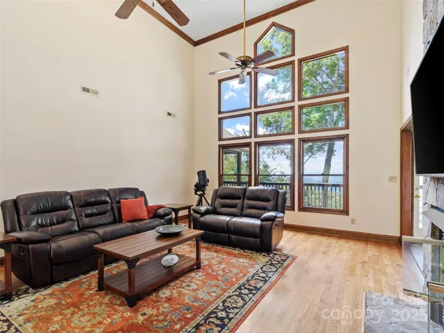 a living room with furniture or couch and a flat screen tv