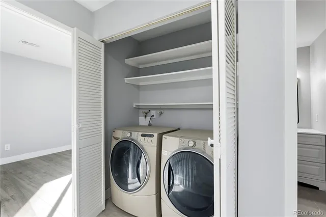 a utility room with dryer and washer
