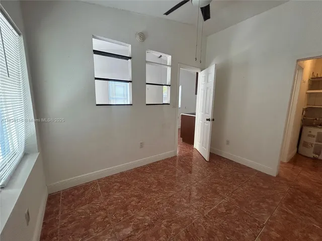 a view of backyard with trees