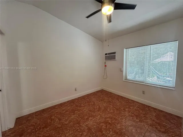 a view of a yard with plants