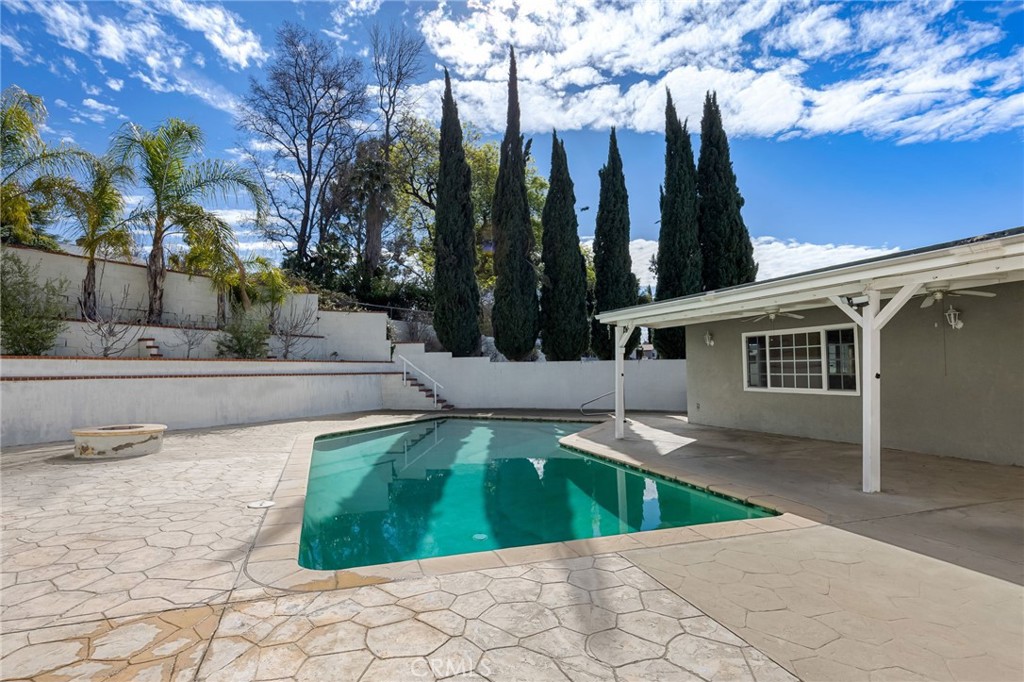 6249 Delfino Street Tujunga, CA 91042 - Photo 39 of 40 a view of a swimming pool with a backyard