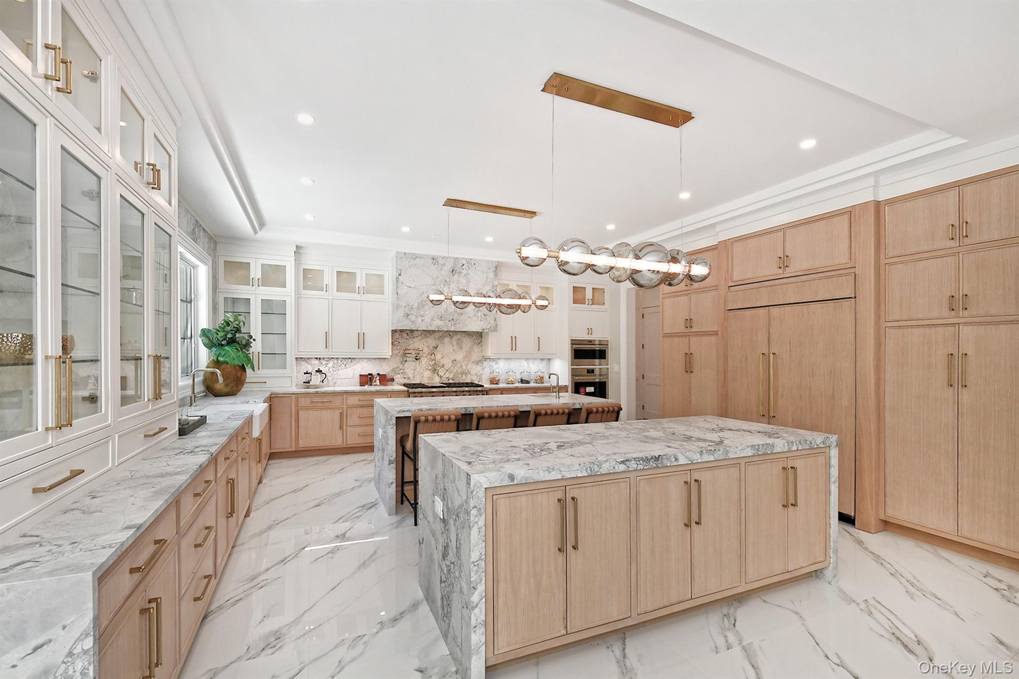 20 Knollwood Road Glen Head, NY 11545 - Photo 16 of 50 a large white kitchen with a large window