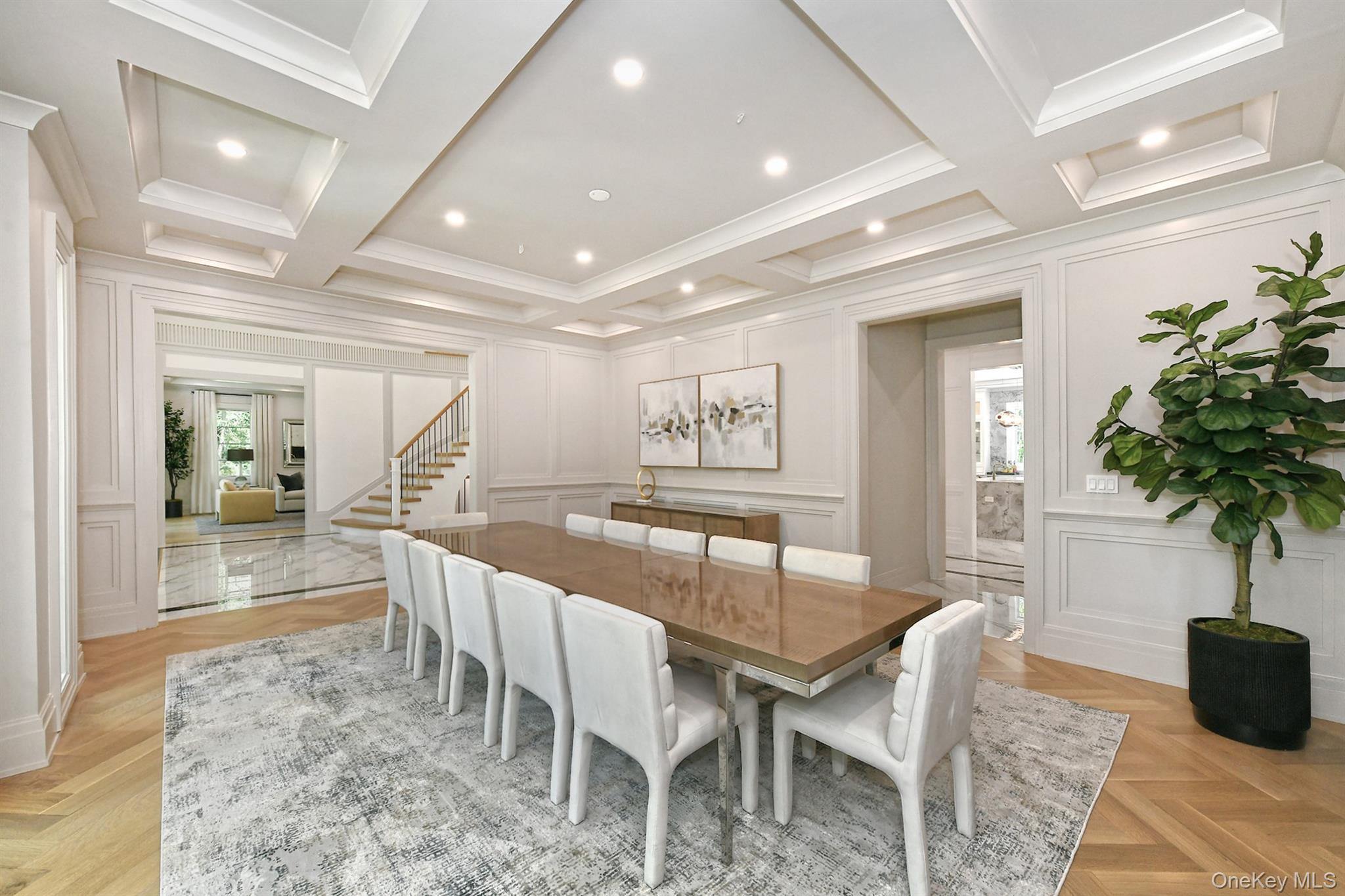20 Knollwood Road Glen Head, NY 11545 - Photo 21 of 50 a dining room with furniture and potted plants