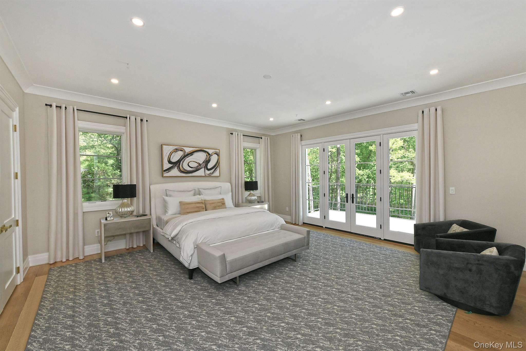 20 Knollwood Road Glen Head, NY 11545 - Photo 27 of 50 a bedroom with a large bed and a large window