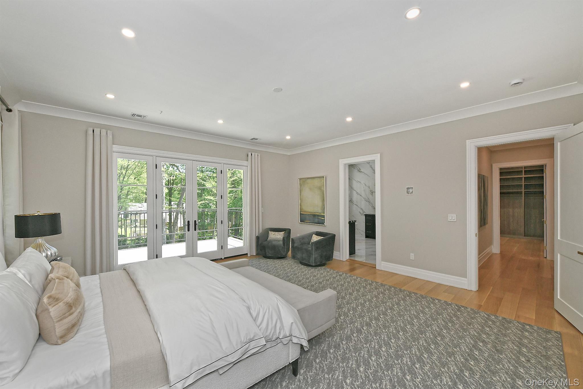 20 Knollwood Road Glen Head, NY 11545 - Photo 28 of 50 a bedroom with a large bed and a large window