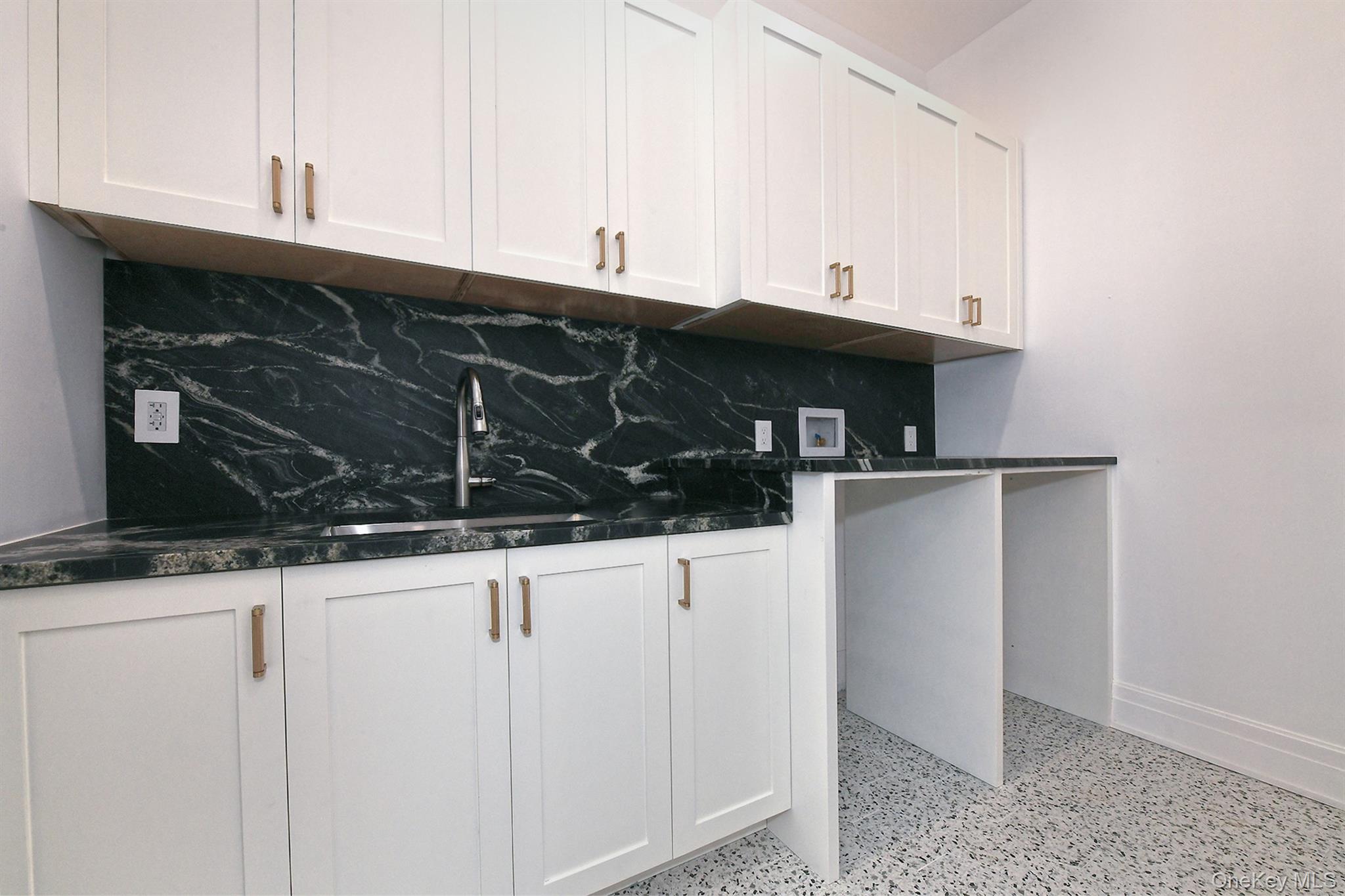20 Knollwood Road Glen Head, NY 11545 - Photo 38 of 50 a kitchen with a sink and cabinets