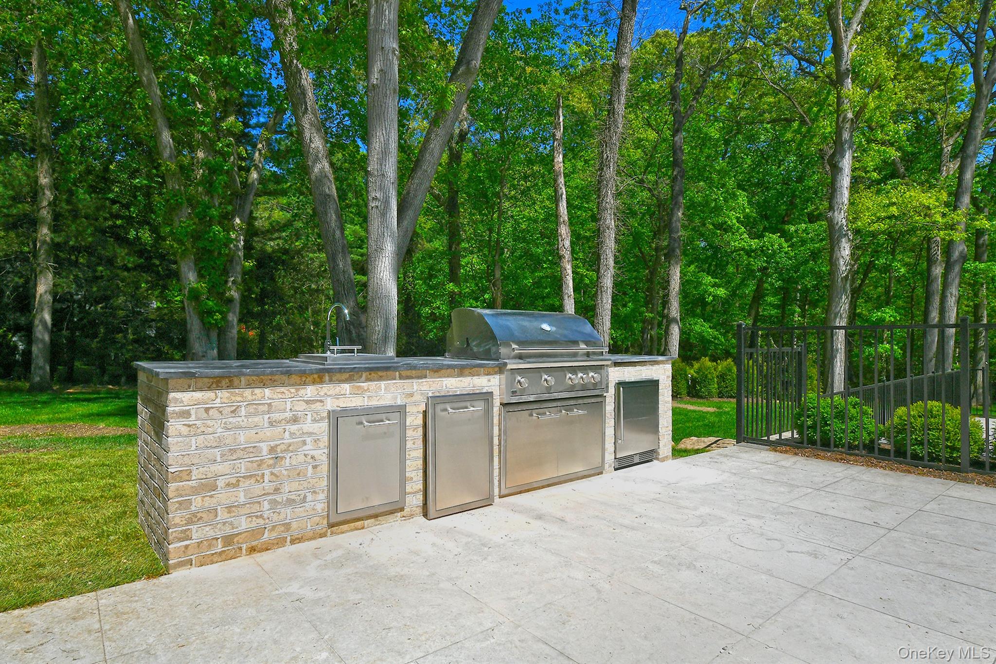20 Knollwood Road Glen Head, NY 11545 - Photo 43 of 50 a view of backyard with trampoline