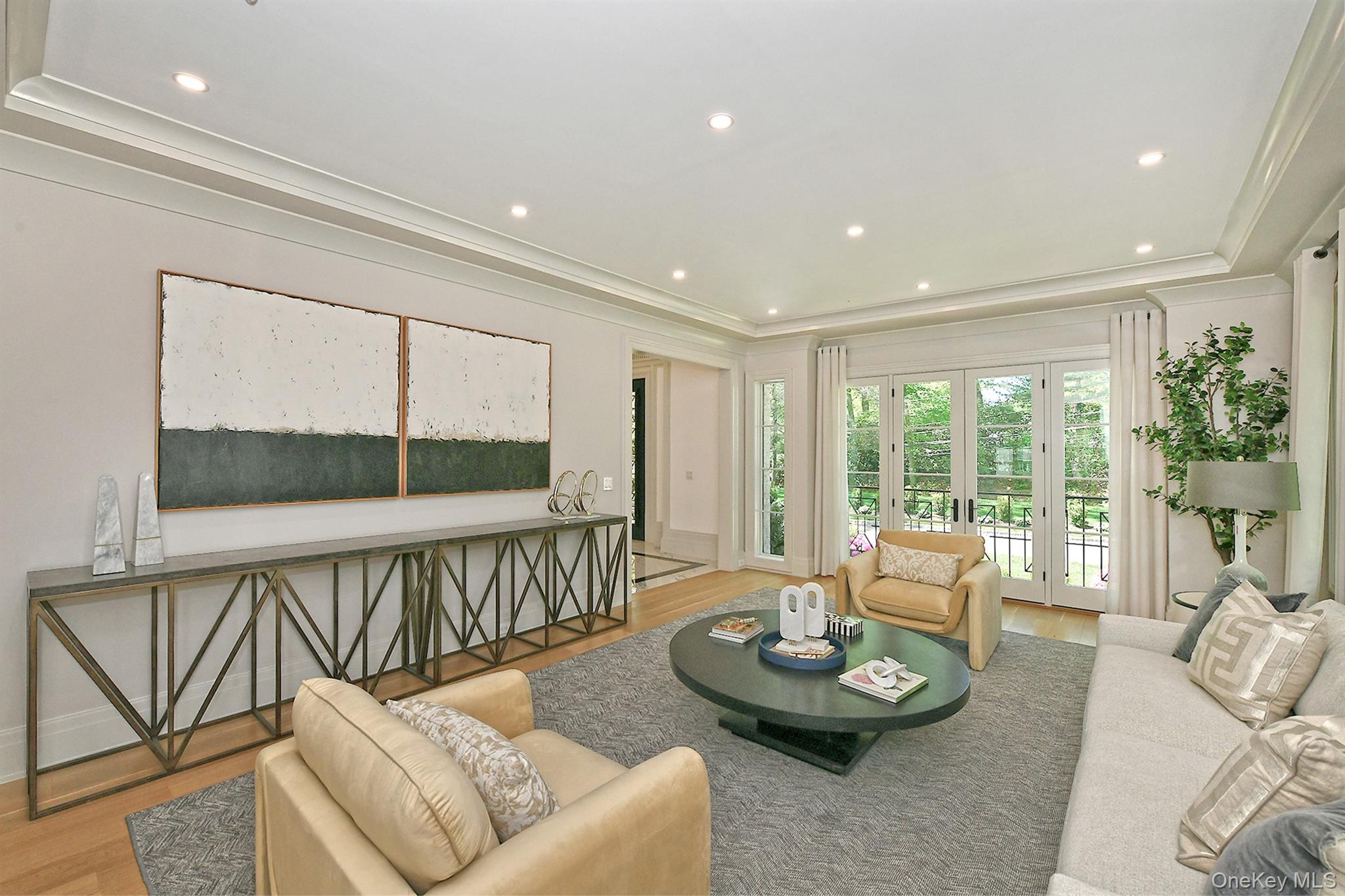 20 Knollwood Road Glen Head, NY 11545 - Photo 9 of 50 a living room with furniture and a wooden floor