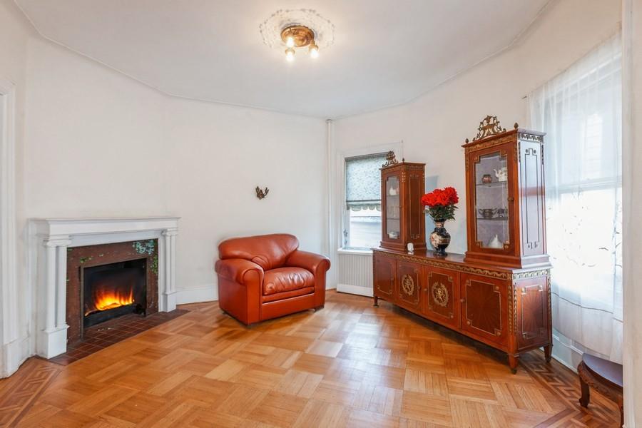 1205 Beverley Road Brooklyn, NY 11218 - Photo 6 of 34 a living room with furniture a fireplace