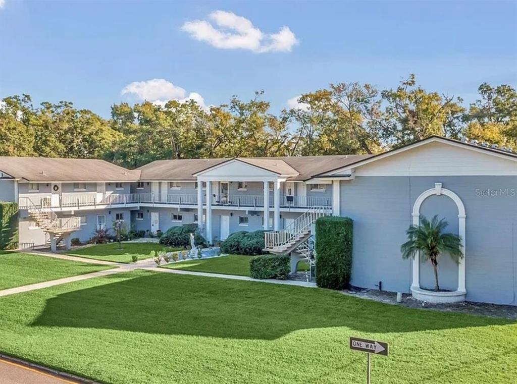 a view of a yard in front of a house