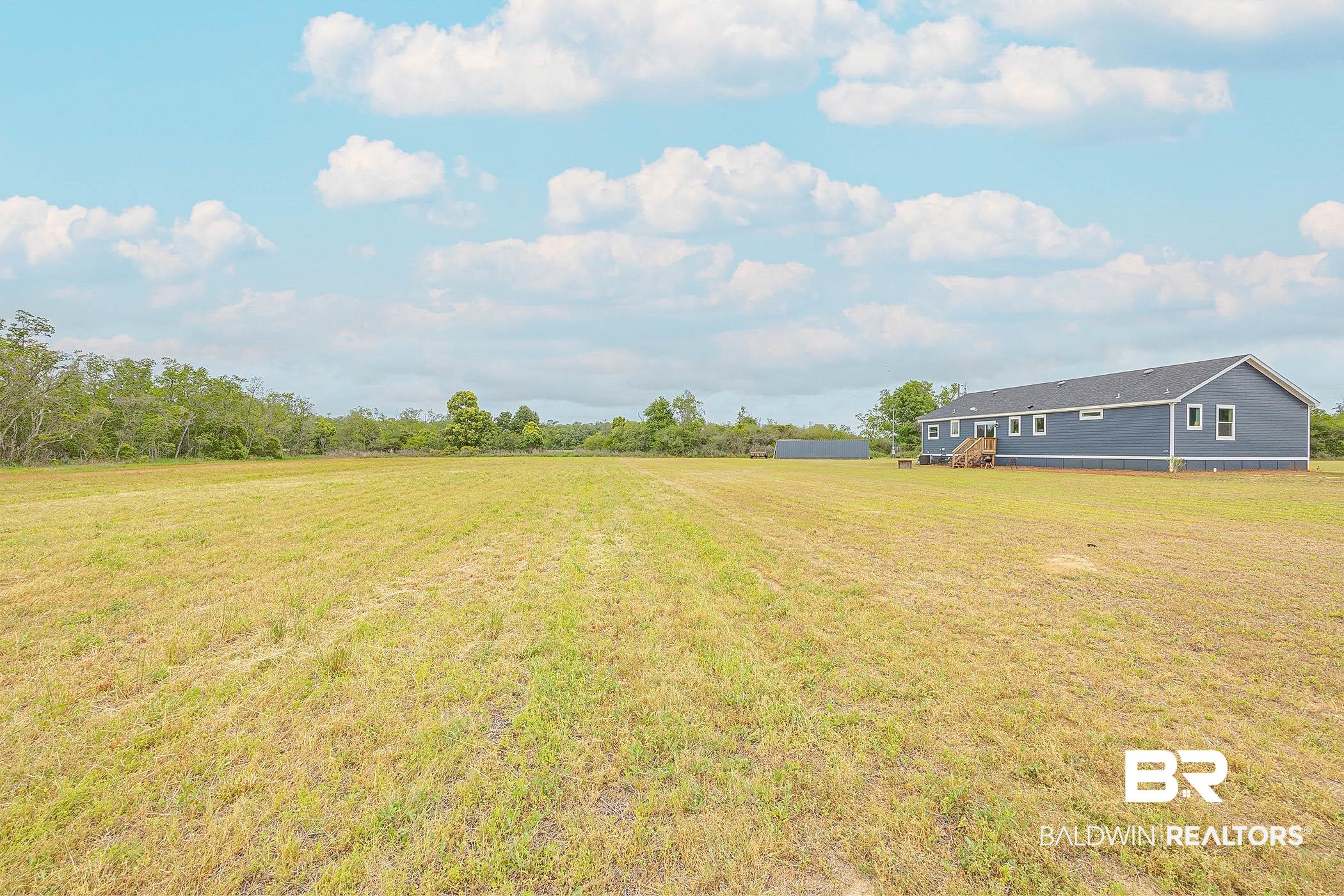 16000 John Bauer Road Summerdale, AL 36580 - Photo 28 of 34 View of yard with a rural view
