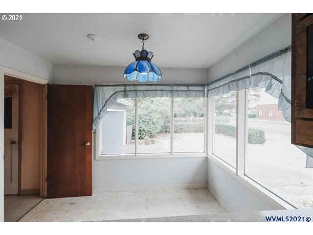 160 Tangent Street Lebanon, OR 97355 - Photo 6 of 32 a living room with furniture and a large window