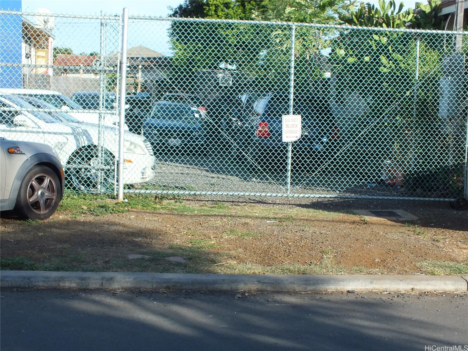 729 Gulick Avenue Honolulu, HI 96819 - Photo 1 of 7 a view of a door with a tennis court