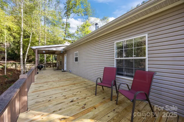 a view of a chairs and a tables in the balcony