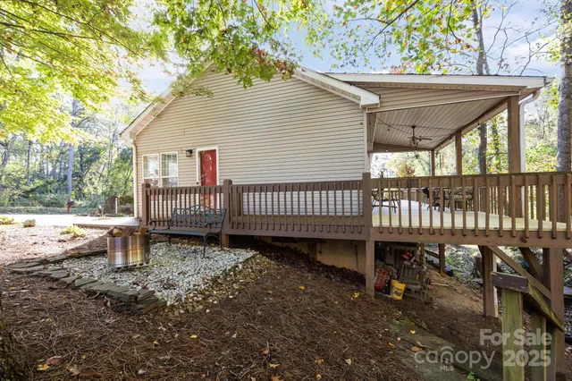 a view of a deck with a yard
