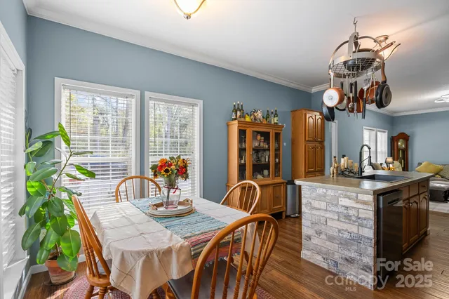 a bed room with a bed and a television