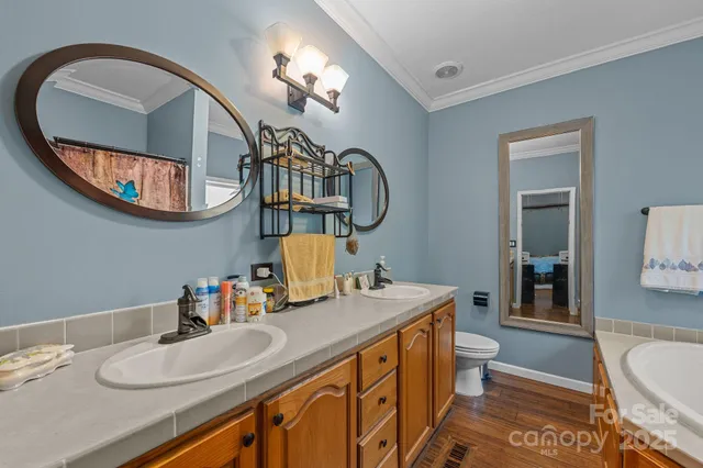 a bathroom with a tub and shower