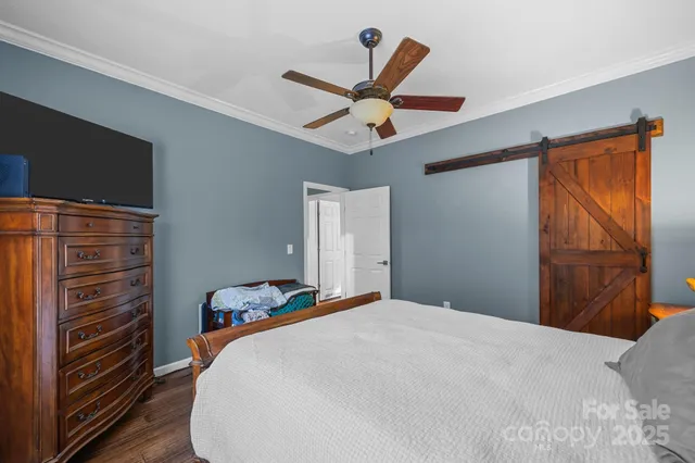 a bathroom with a sink vanity mirror and toilet