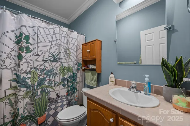 a view of a workspace with furniture and a workspace