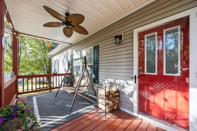 a view of a balcony with furniture