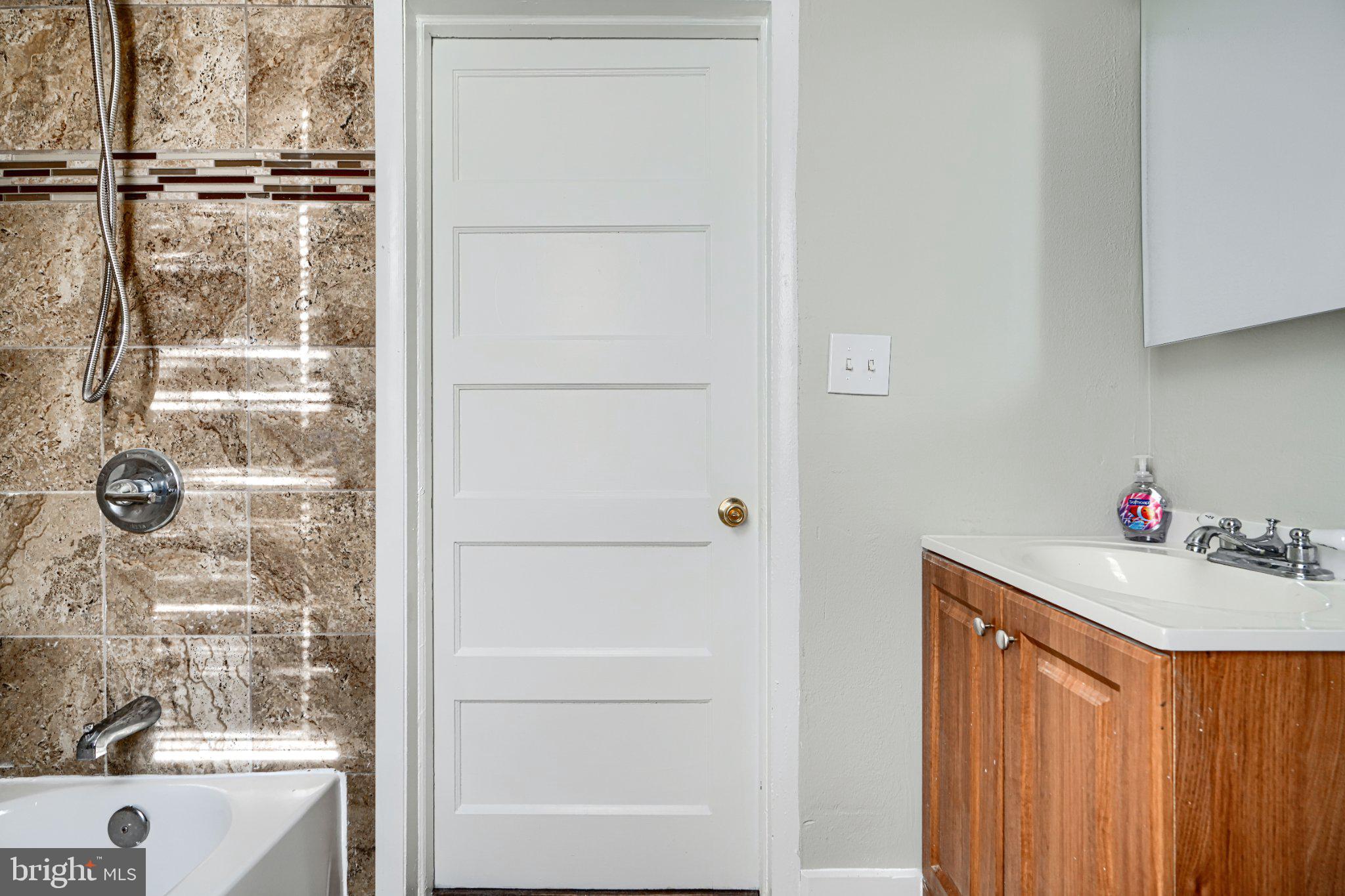 3414 Alto Road, Unit 2 Baltimore, MD 21216 - Photo 22 of 26 Modern bathroom with elegant finishes.