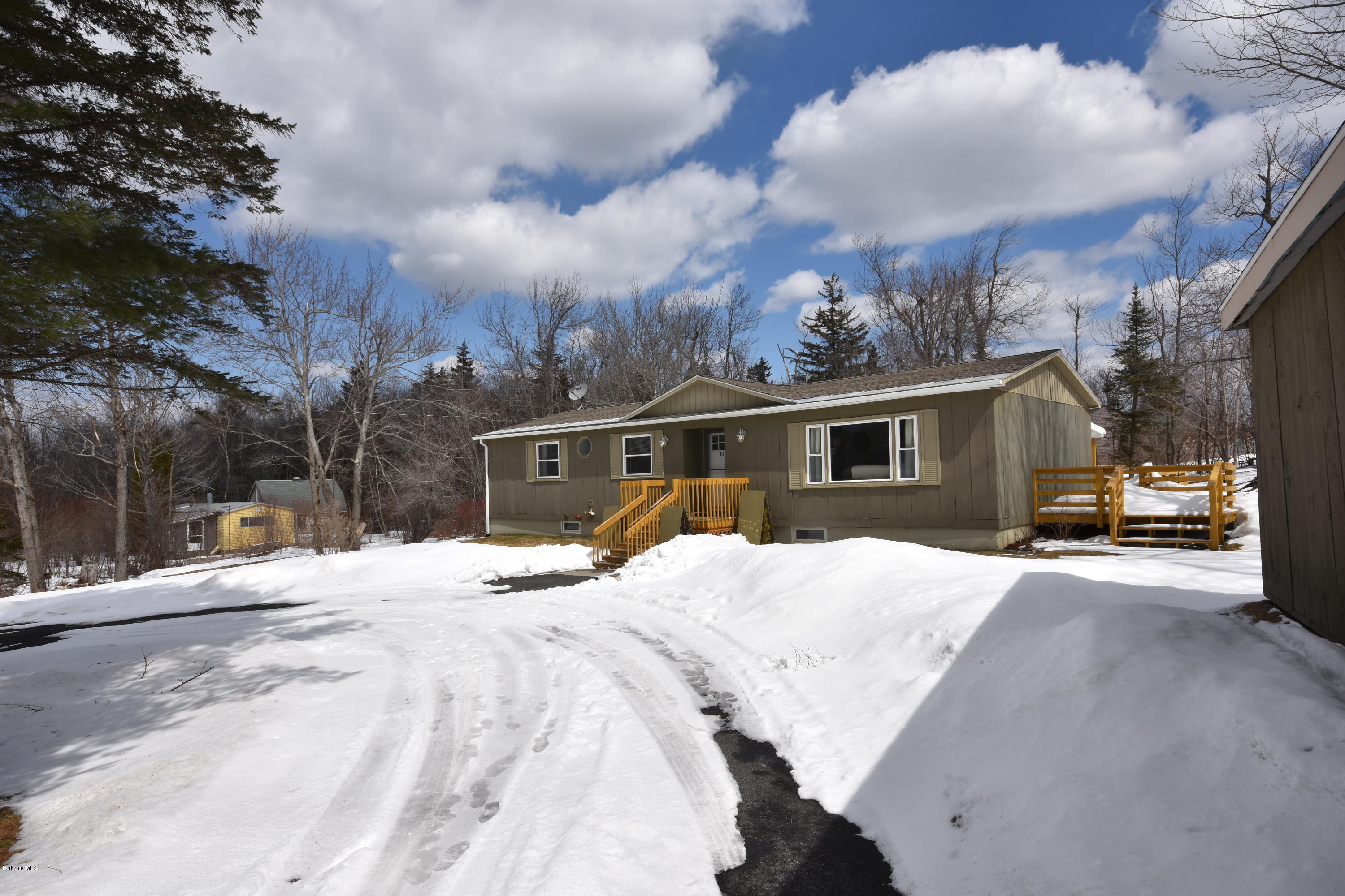 10 West Main Road Peru, MA 01235 - Photo 2 of 45 a front view of a house with a pathway