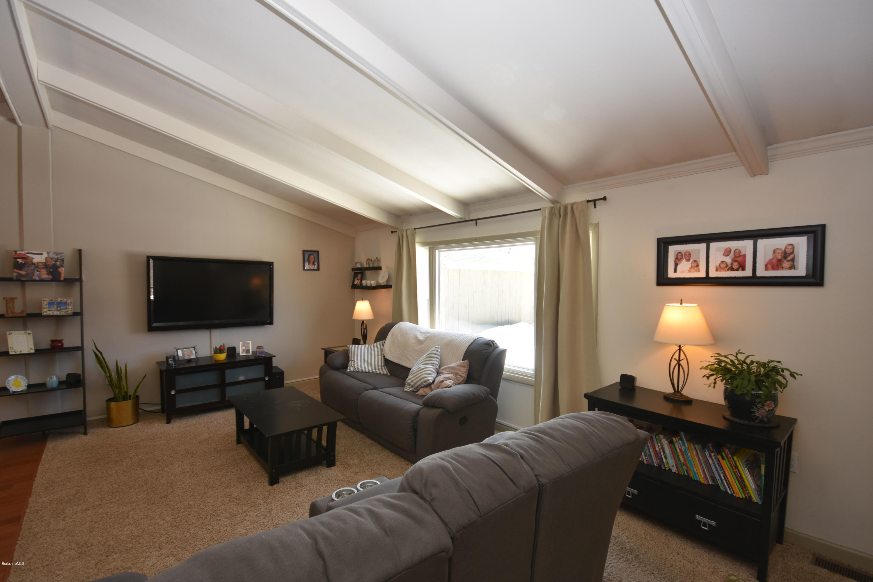 10 West Main Road Peru, MA 01235 - Photo 11 of 45 a living room with furniture and a flat screen tv